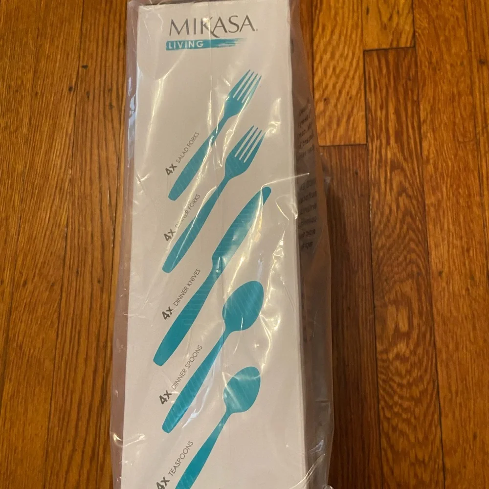 Mikasa Living new 20 piece premium stainless steel cutlery. Never opened.